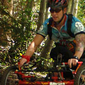 riding one off on trail in the woods