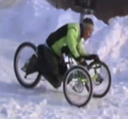 snow riding demonstration of one off handcycle